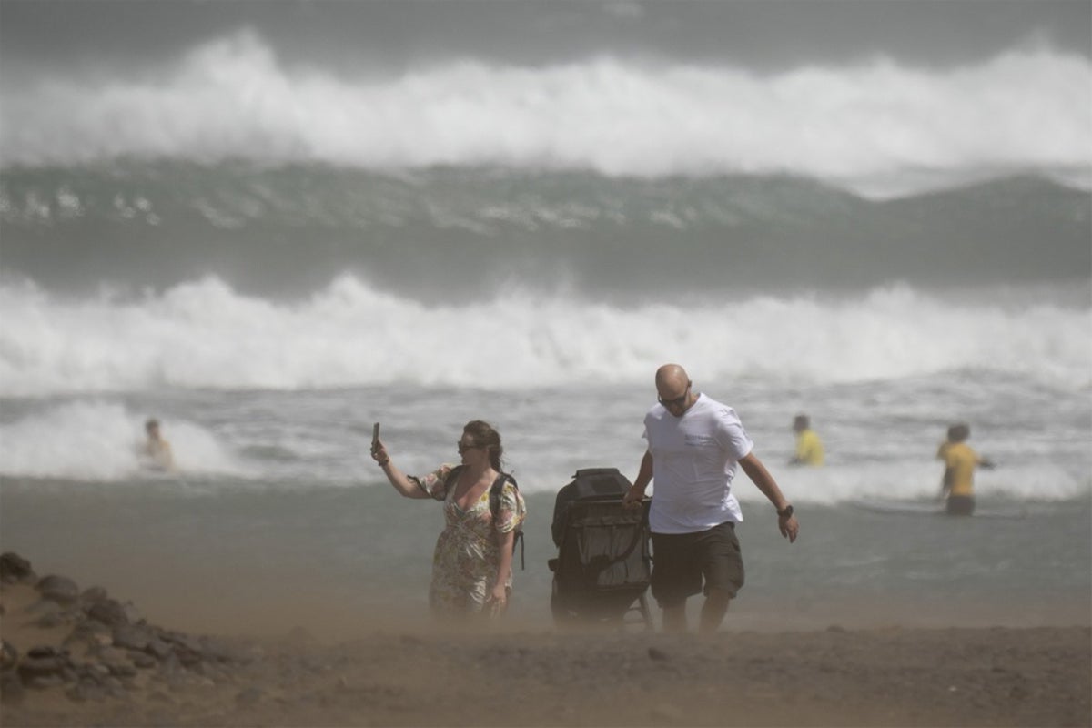 UK Heatwave: Spain Faces Snow Warnings
